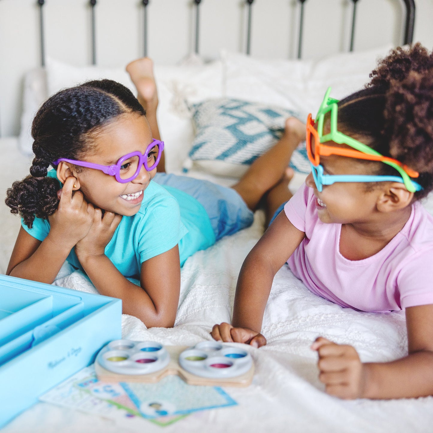 A kid playing with The Melissa & Doug Blues Clues & You! Time for Glasses Play Set